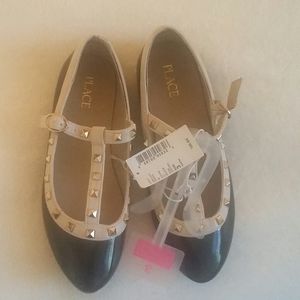 Black and tan studded t-bar flats